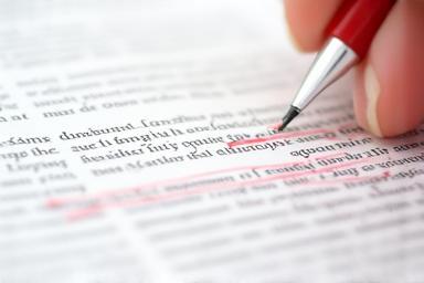 Image representing copyediting focusing on text and proofreading marks